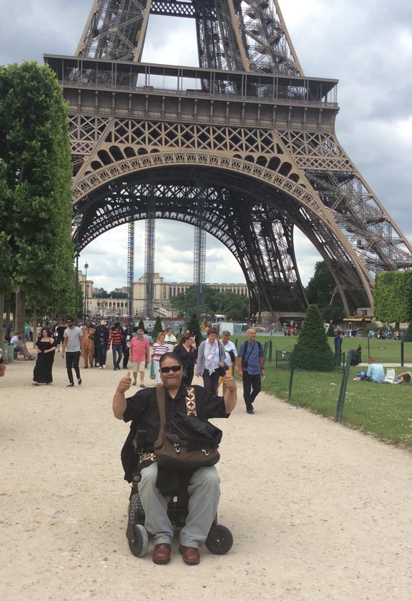 Pati Umaga in front of the Eiffel Tower in Paris