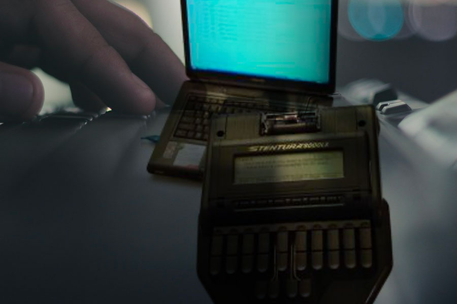Stenography NZ Image Hand typing on a stenography machine