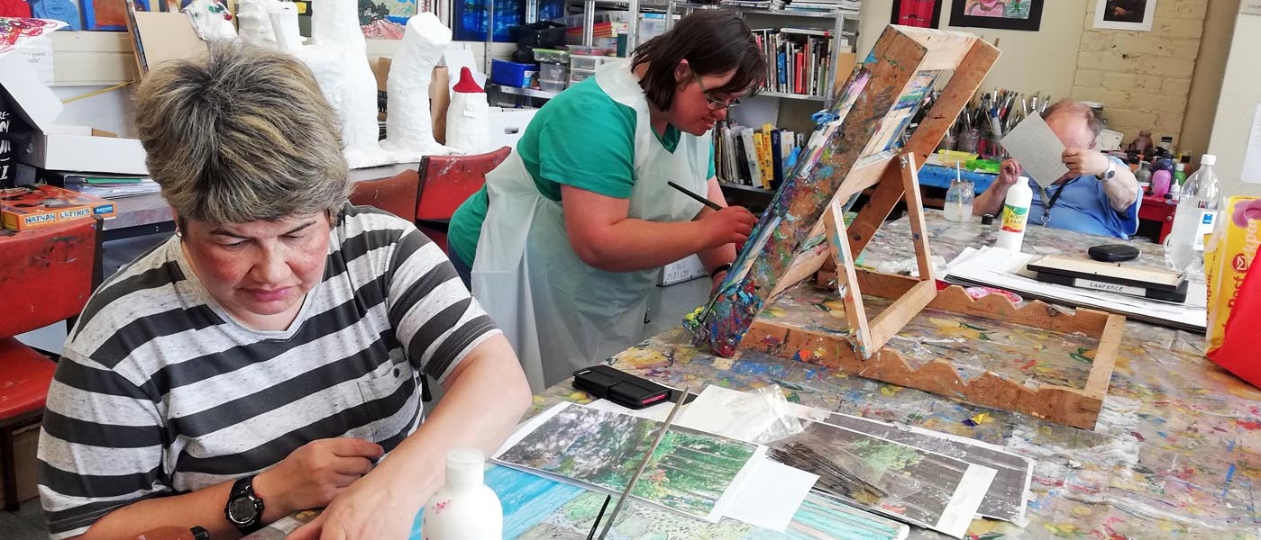 Artists from C.S. Art working on their art in the Invercargill creative space