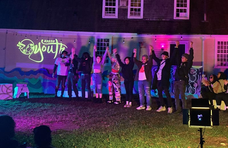 AS220 youth members take a bow during their annual showcase, Futureworlds, in partner organisation Haus of Glitter’s garden, October 2021 Photo: Ruth Harvey