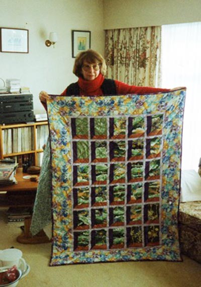 June Nixey in 1996 with the quilt she swapped for a painting