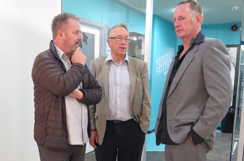Richard Benge and Howard Fancy of Arts Access Aotearoa talk to Simon Kerr at the exhibition opening