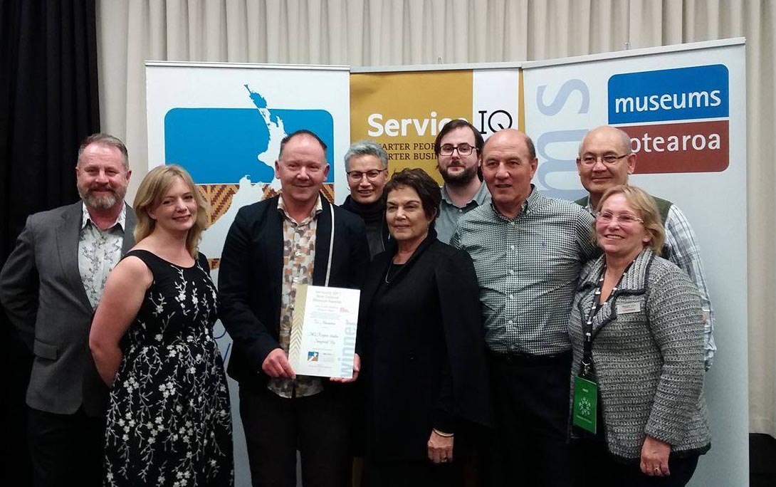 Richard Benge, left, with Te Manawa staff