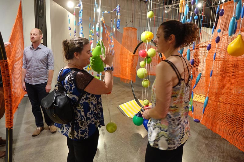 Claire Noble, right, and Karen Plimmer, the Blind Foundation, at an Arts For All Auckland Network meeting