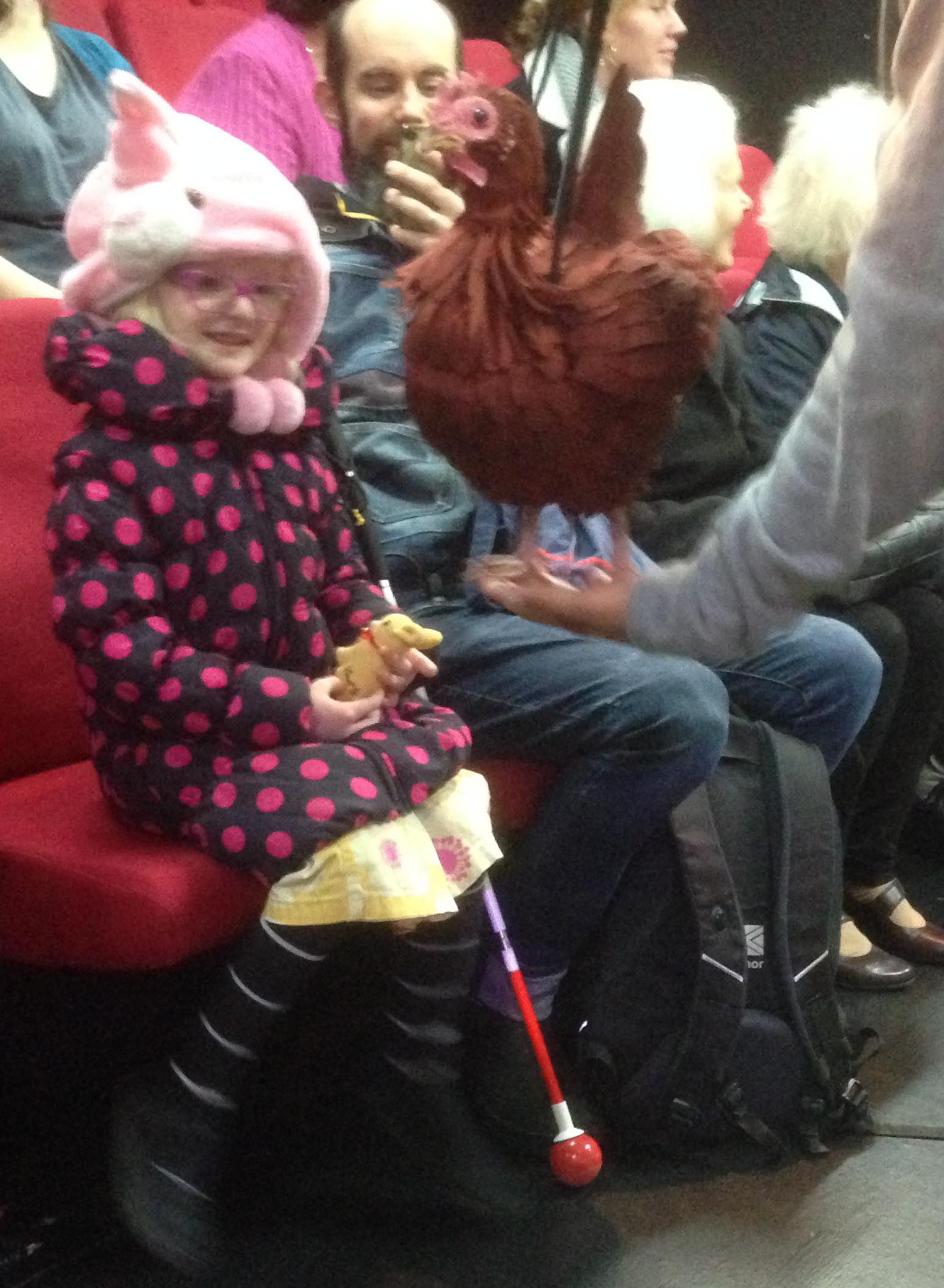 Saskia enjoys a touch tour of Still Life With Chickens
