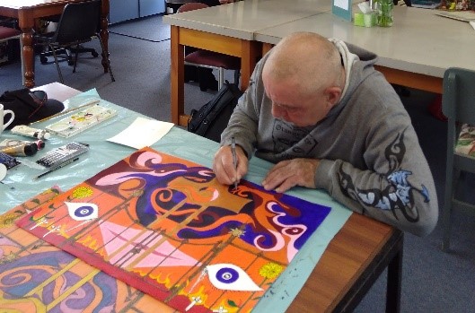 An artist at work at Otautahi Creative Spaces