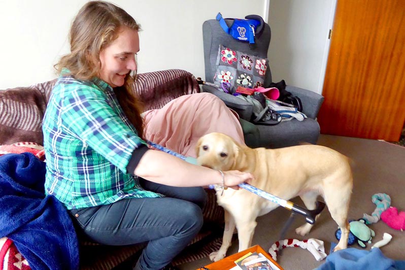 Helen Vivienne Fletcher with her assistance dog, Bindi