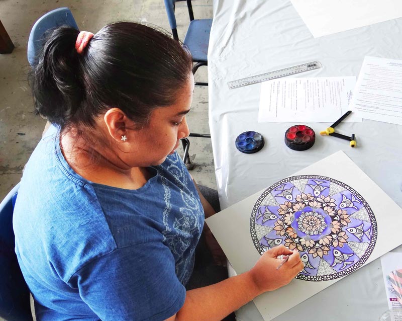 Artmakers artist Tina paints Mandala 
