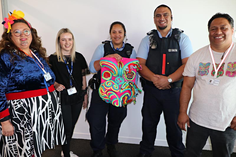 MECF staff receive the Harakoa crochet sculpture created by MECF men. (L-R) Lissy Robinson-Cole, MECF Regional Volunteer Co-ordinator Ghissy Lee, Senior Corrections Officer Charity Niha, Principal Corrections Officer Sean Kelly, and Rudi Robinson.