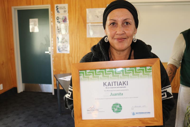 Volunteer Juanita Davis receives her award