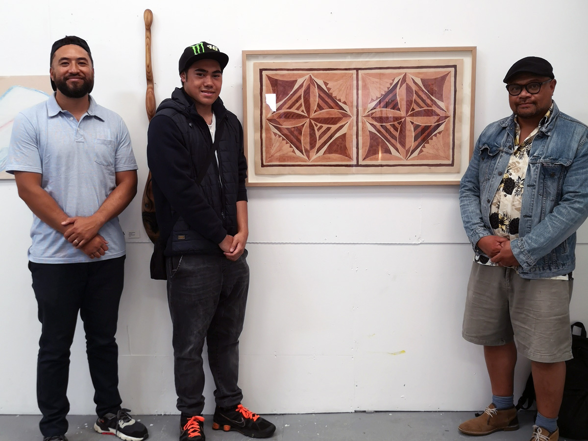 Gary Silipa (L) with Kākano Youth Arts Collective artist Isakara and artist Andy Leleisi'uao (R) at Corban Estate Arts Centre