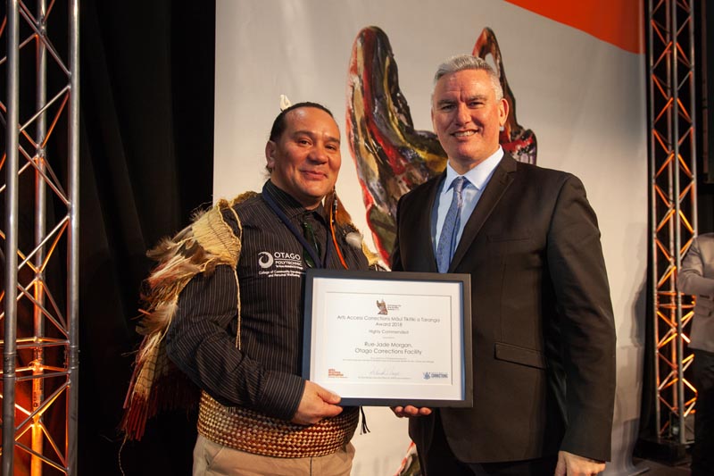 Rue-Jade Morgan receiving a Highly Commended certificate from Hon Kelvin Davis at Te Putanga Toi Arts Access Awards 2018