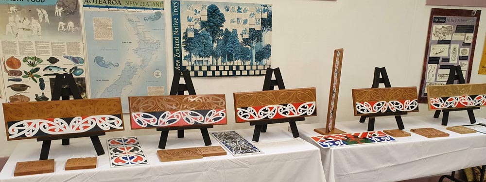 Completed work showcased at the graduation of participants in the whakairo workshop