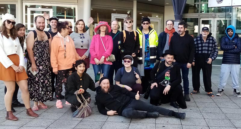 A group of Pablos artists and staff standing outside Te Papa