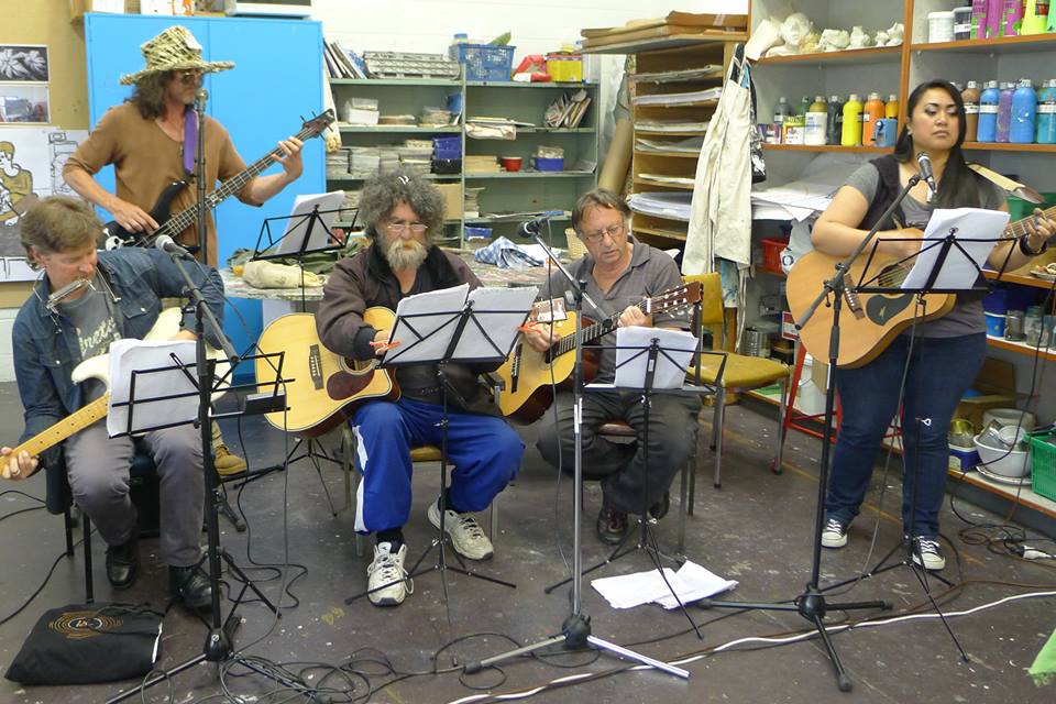 Musicians perform at an end-of-term celebration