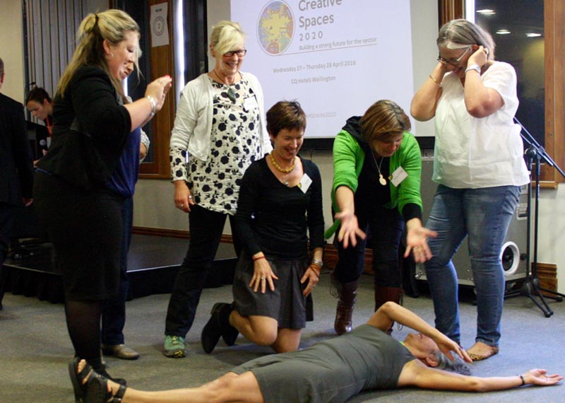Alexia Martin and Lyn Cotton, at right, participate in an ice-breaker exercise at the Creative Spaces 2020 conference