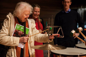 Photography credit: Pauline Lévêque - The Wellington Rhythm and Resonance 2014, Ann Bain tries out the triangle during the touch tour