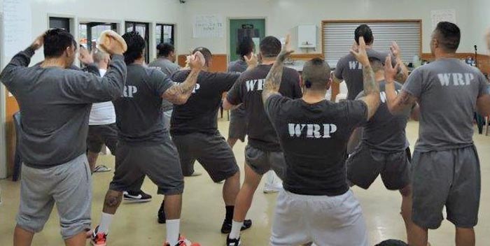 Rob Mokaraka performs a haka with the prisoners at Rimutaka Prison