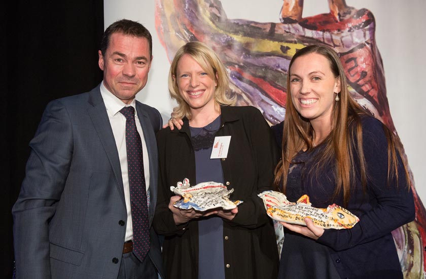 Olivier Lacoua, CQ Hotels Wellington, presents the award to Laura Haughey, Equal Voices Arts, and Kayte Shaw, Deaf Aotearoa