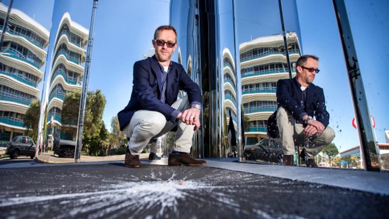 Simon Rees, Director of the Len Lye Centre, outside the paint-splattered building Photo: Andy Jackson/Fairfax NZ