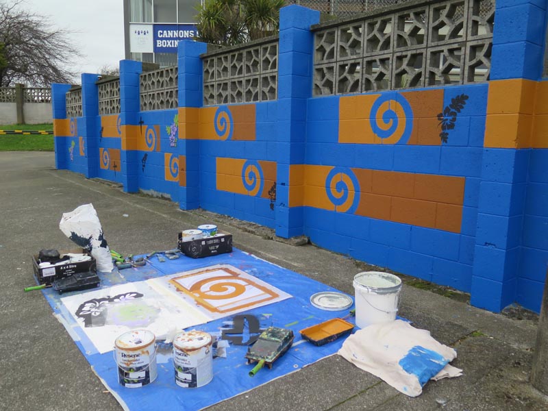 Paint, rollers and stencils needed to paint the mural