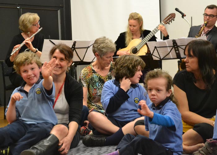 Children from Mahinawa Specialist School enjoy a relaxed performance with Trio Amistad, presented by Chamber Music New Zealand  Photo: Hannah Beattie Photography, courtesy Chamber Music New Zealand