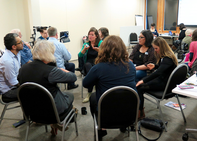 Symposium participants share their knowledge