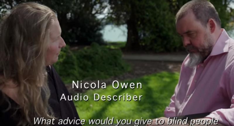 Audio describer Nicola Owen talks to blind consultant Paul Brown in the video Arts For All