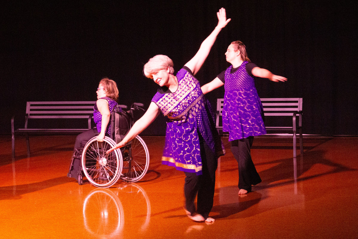 Three dancers on stage during the Platform 12 anniversary performance.