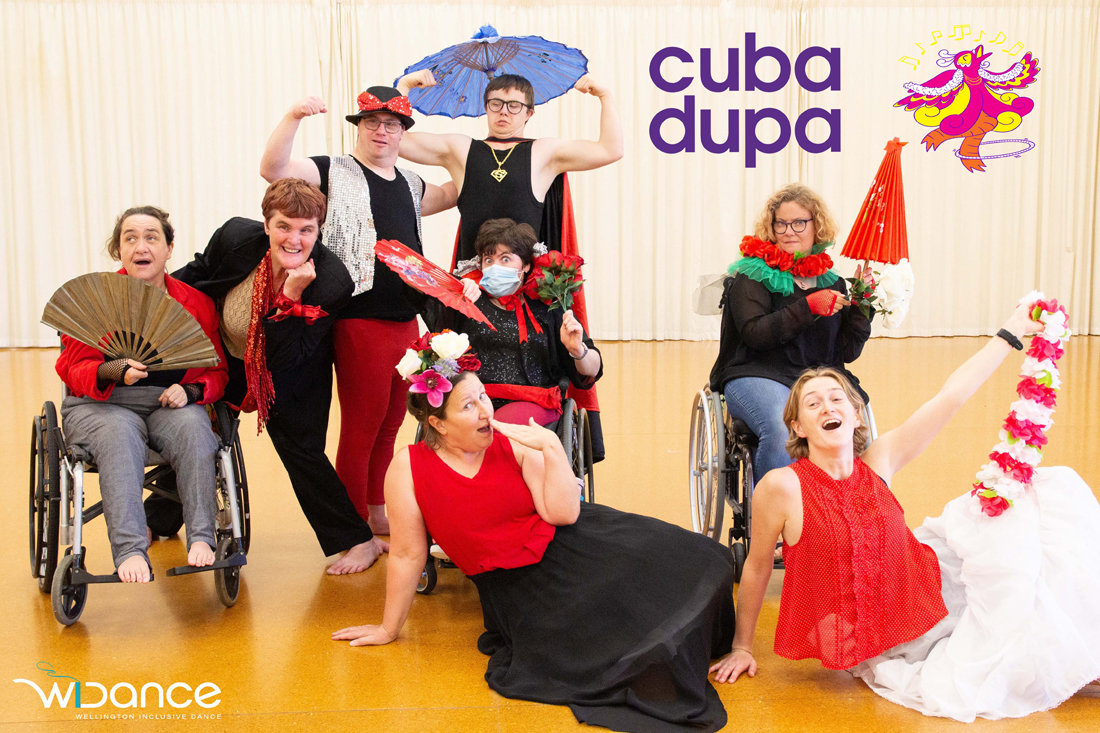 Eight dancers pose during a dress rehearsal in the studio for Cupa Dupa 2023